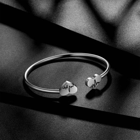 Pulseira feminina com punho aberto e coração, joia de aço inoxidável